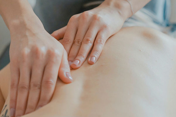Therapist Massaging back